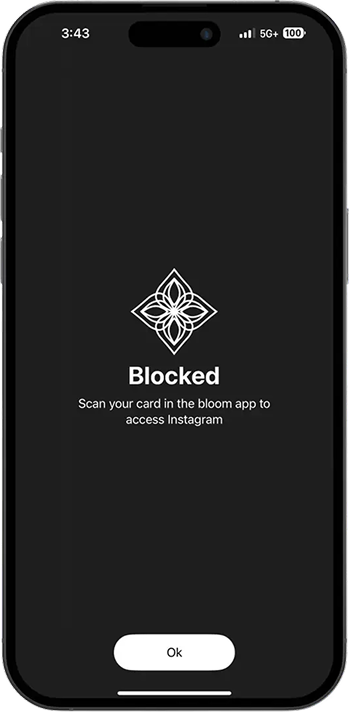 A phone showing the ZenLock block screen: Blocked — scan your card to access the app.